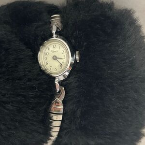 Vintage Timex Women's Silver Tone Manual Wind Oval Stainless Stretch Band Watch